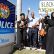 Protesters shout as they arrive at a police station during a protest march in Ottawa, Canada, on July 30, for Abdirahman Abdi.